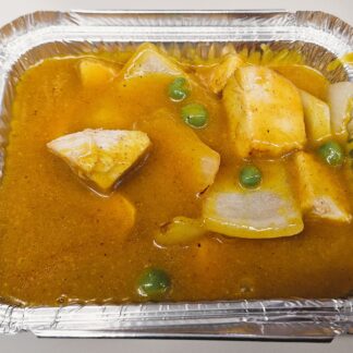 Chicken and mixed vegetable curry in a rich, spiced sauce, served hot and aromatic