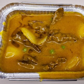 Beef and mixed vegetable curry in a rich, spiced sauce, served hot and aromatic