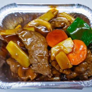 Stir-fried takeaway beef with carrots, peppers, and other vegetables