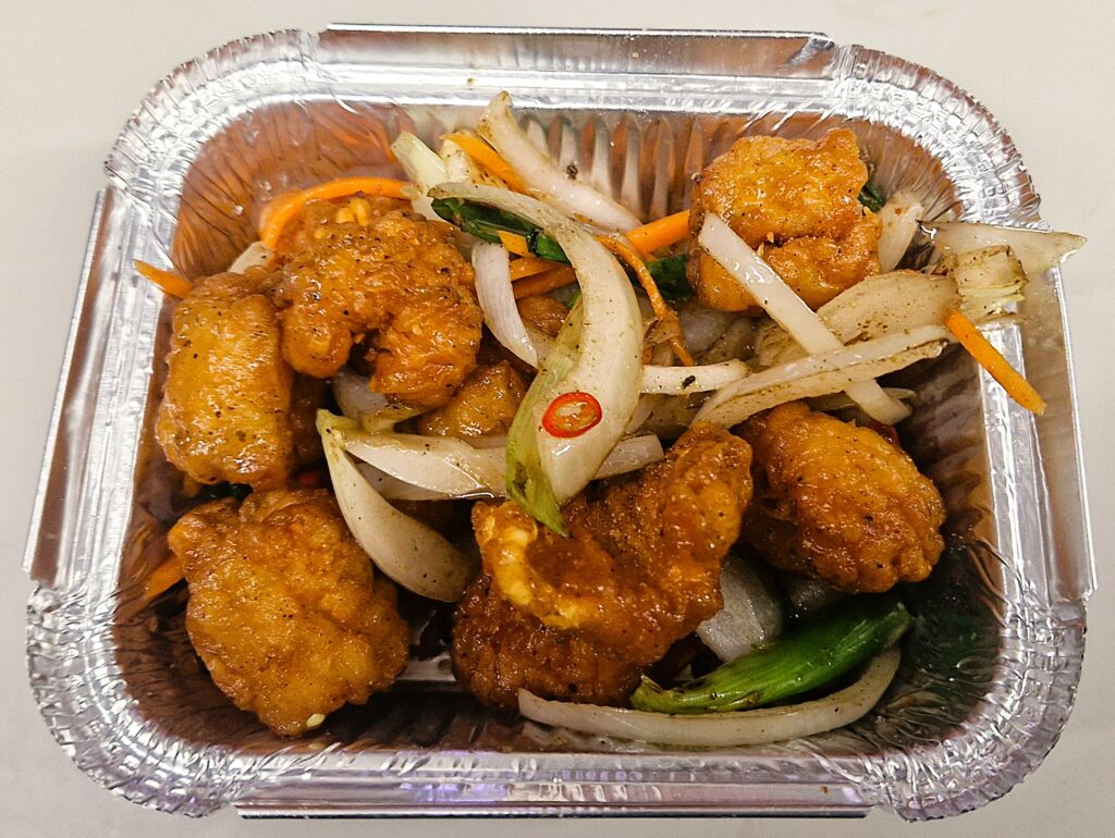 Salt and pepper deep-fried squid with union, chilli and garlic