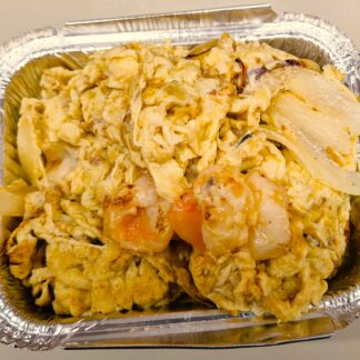 Chinese-style King Prawn Foo Young with sauce