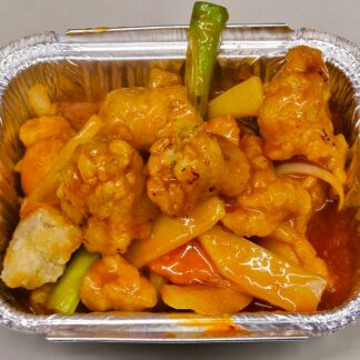 Crunchy fried chicken pieces covered in vibrant red chilli sauce, sweet and spicy